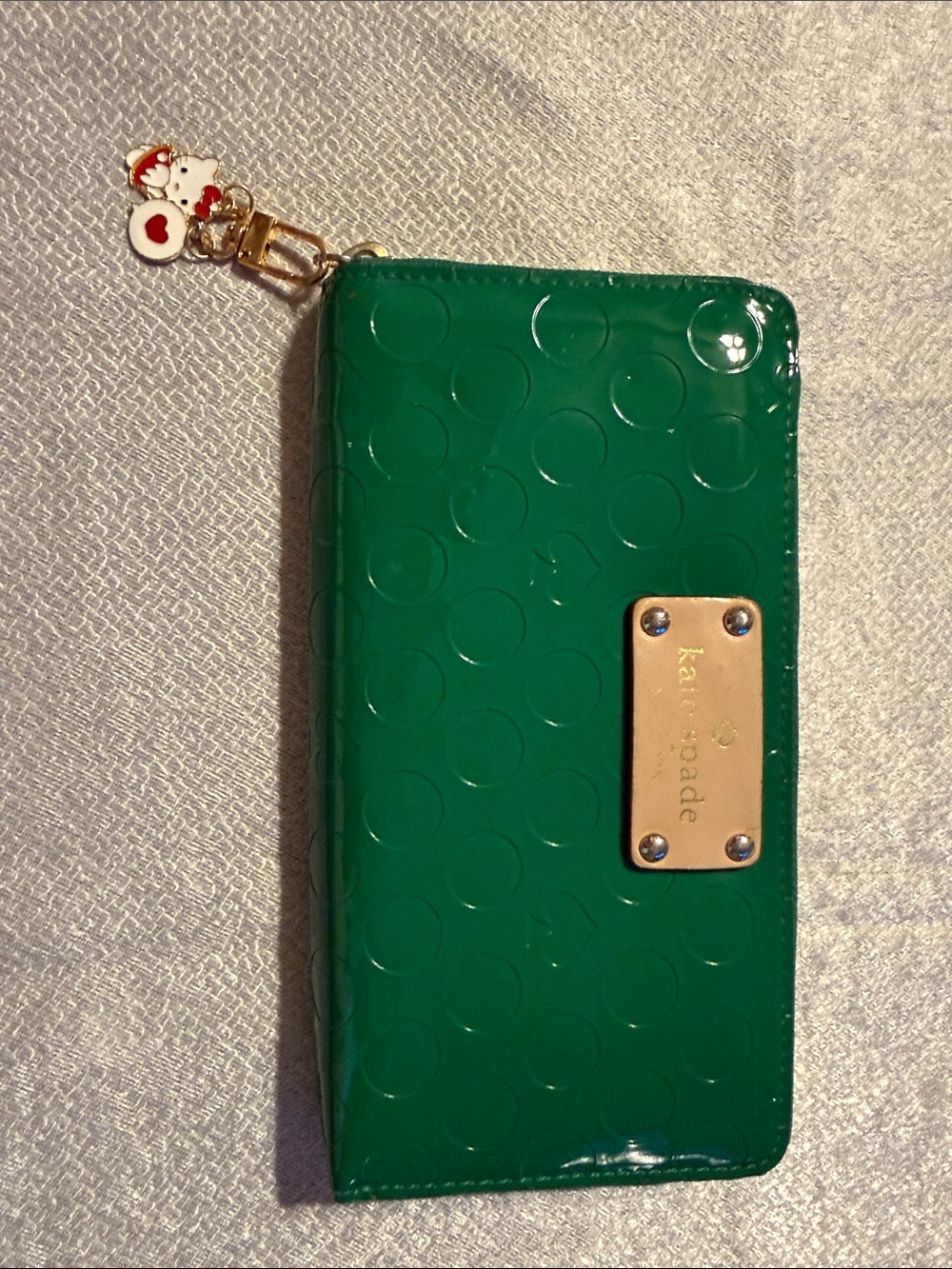 kate spade Green Patent Dot Zip Phone Wallet with Gold Plate
